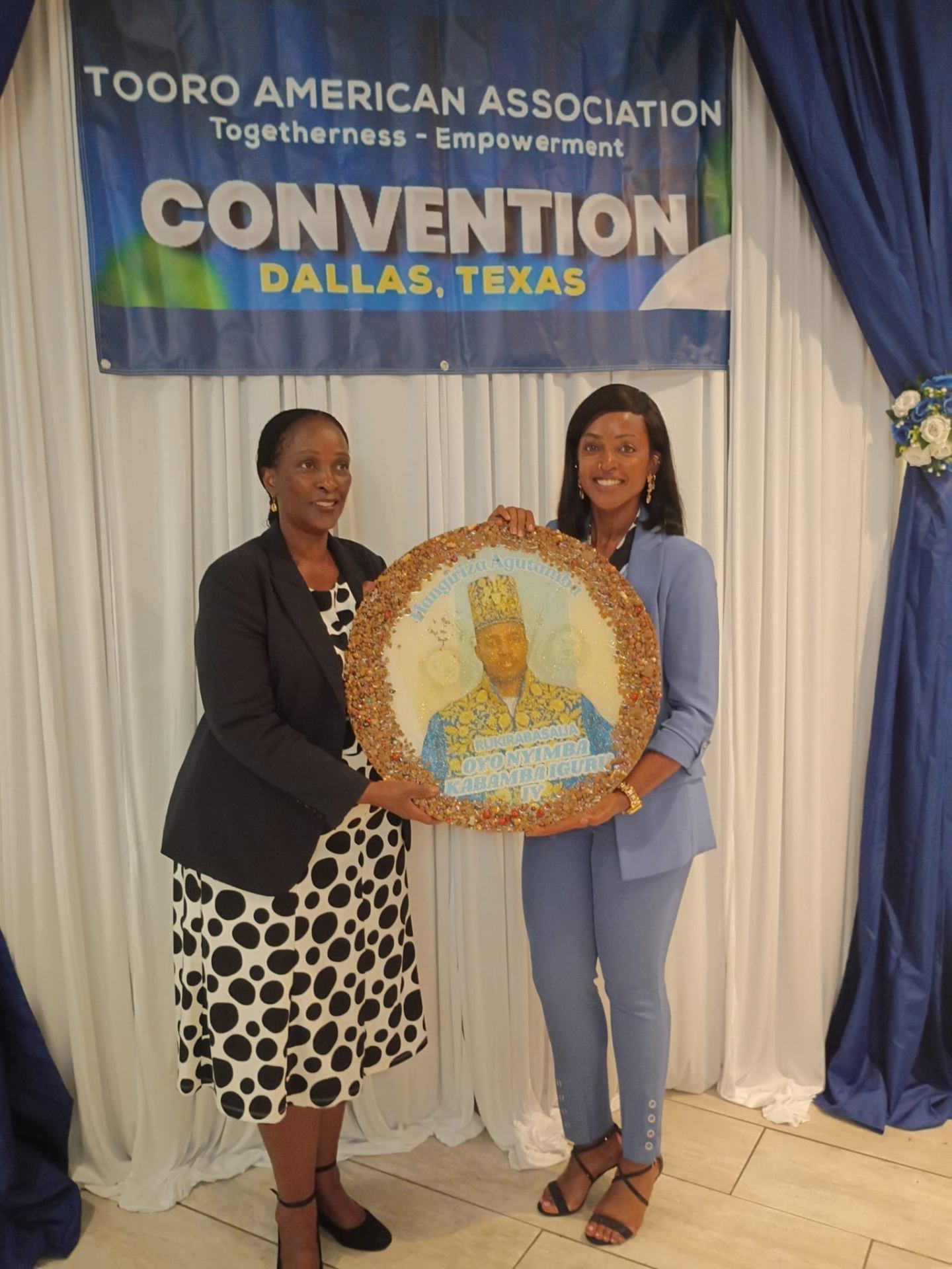Speaker addressing the Tooro America Convention